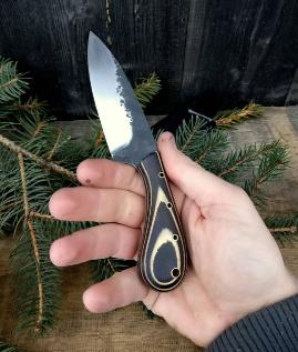 spear point knife with drop point characteristics